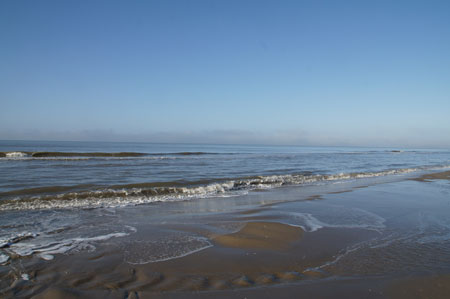 Beach. A blue sea and blue sky.