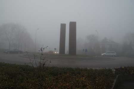 Sculptures in the fog. "De Poort van Bergen" from Herbert Nouwens.
