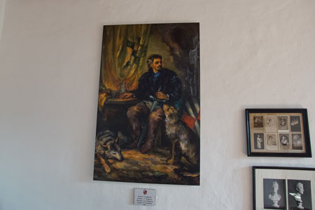 Kasteel Predjama (Grad Predjama), Pedjama castle. Een schilderij van Erasmus. A painting of Erasmus.